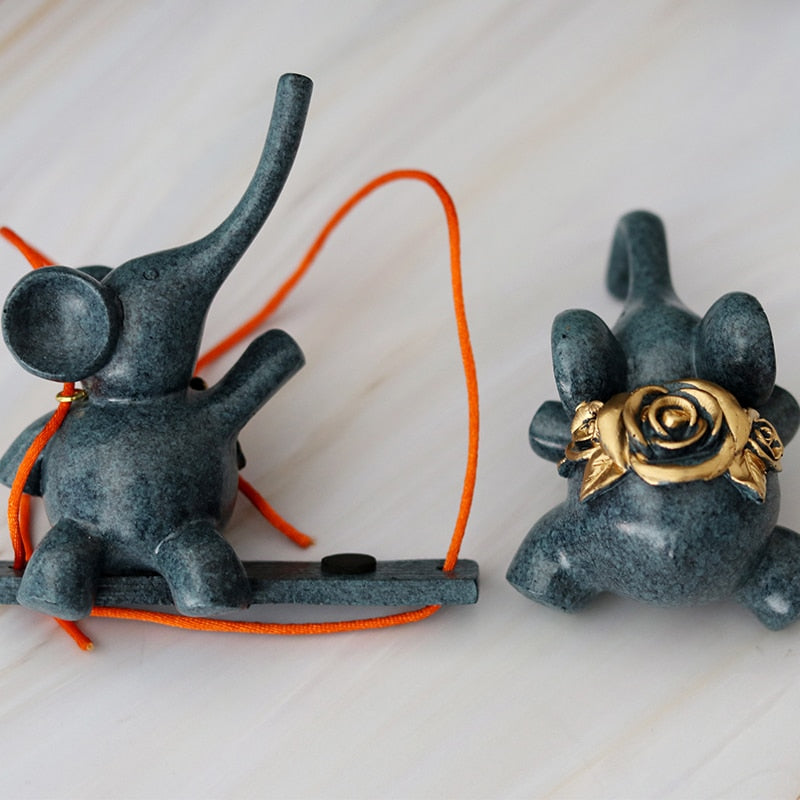 Figurines abstraites de famille d'éléphants