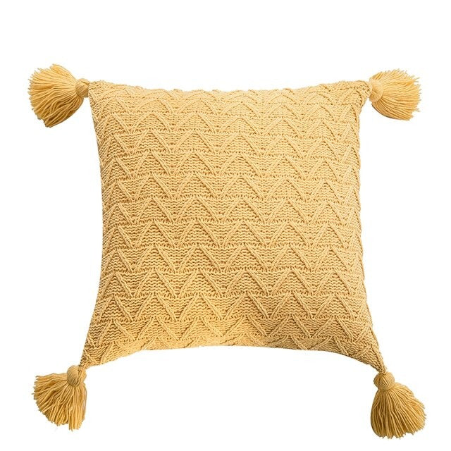 Coussin en tricot de couleur unie
