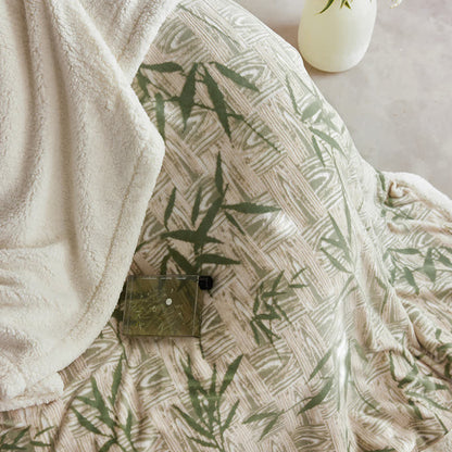 Wende-Sherpa-Decke mit Zen-Bambusblatt-Motiv 