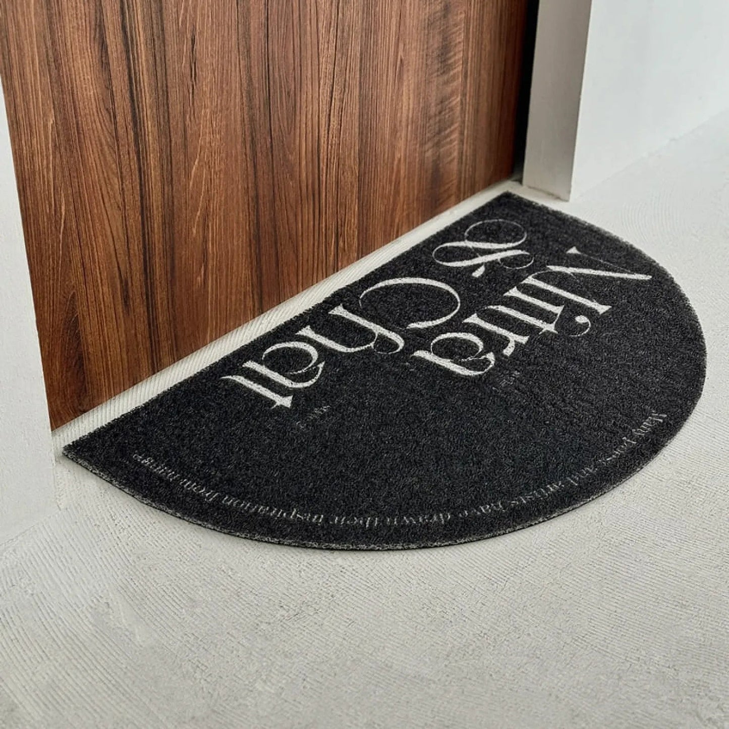 Textured Minimalist Typography PVC Coil Accent Rug