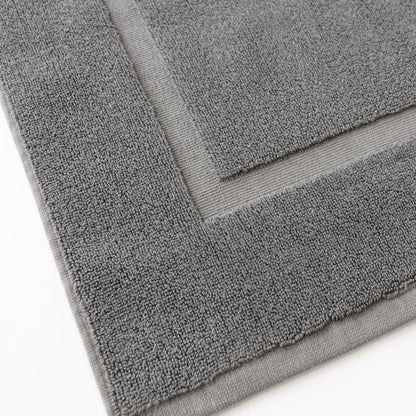 Tapis de bain en peluche de qualité supérieure.