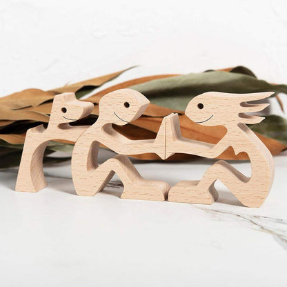 Figurines artisanales en bois d'une famille d'animaux de compagnie