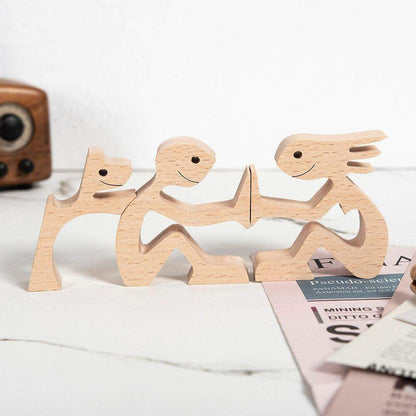 Figurines artisanales en bois d'une famille d'animaux de compagnie