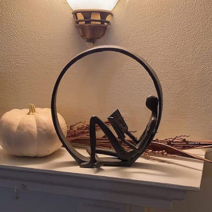 Iron Reader Sculpture