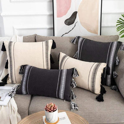 Housses de coussin noires et ivoire