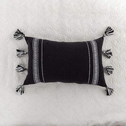 Fundas de almohada negras y marfil.