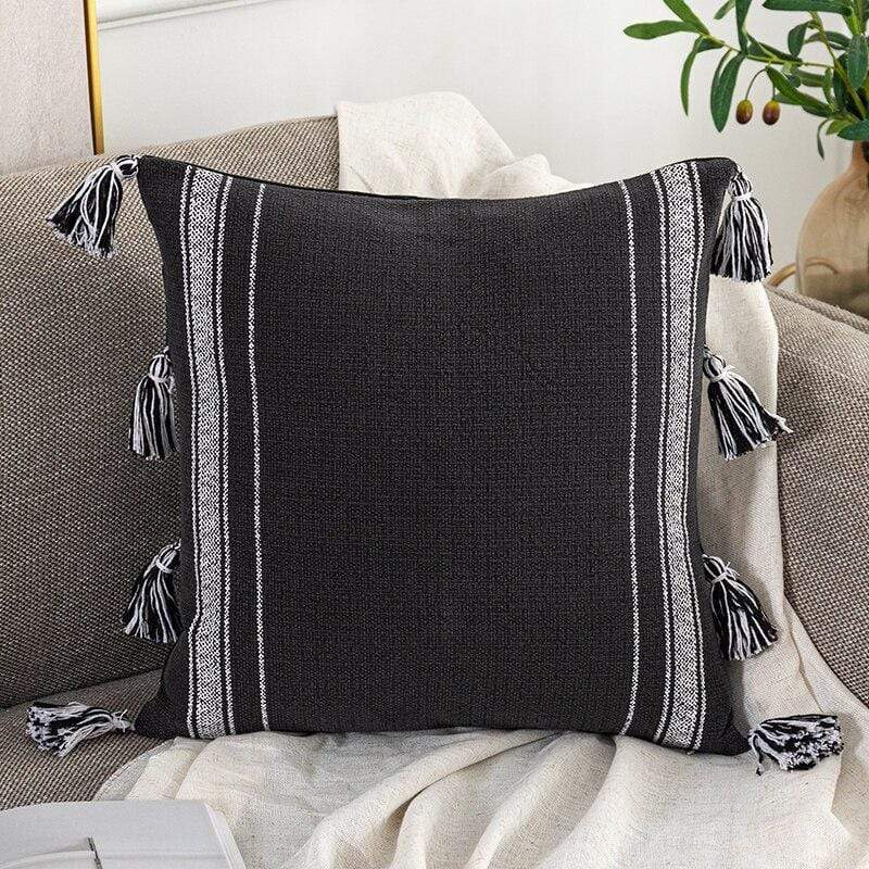 Housses de coussin noires et ivoire