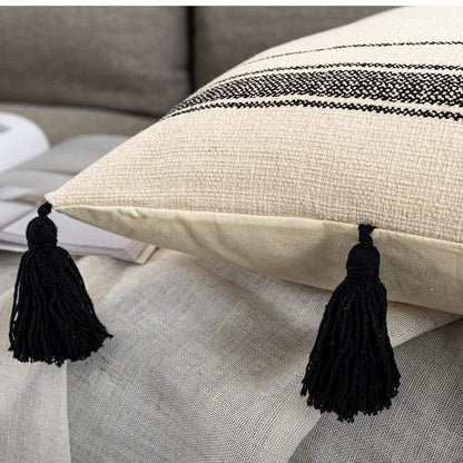 Housses de coussin noires et ivoire