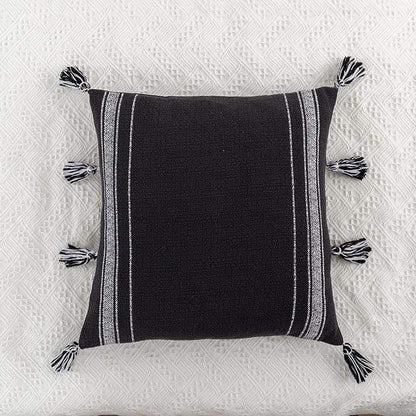 Housses de coussin noires et ivoire