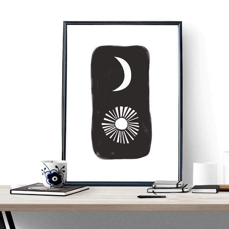 Lienzo decorativo para pared en blanco y negro con sol y luna.