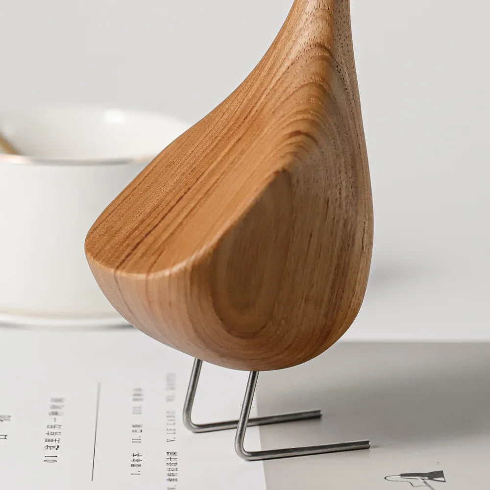 Figurines d'oies nordiques en bois