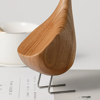 Figurines d'oies nordiques en bois