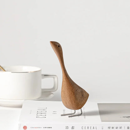 Figurines d'oies nordiques en bois