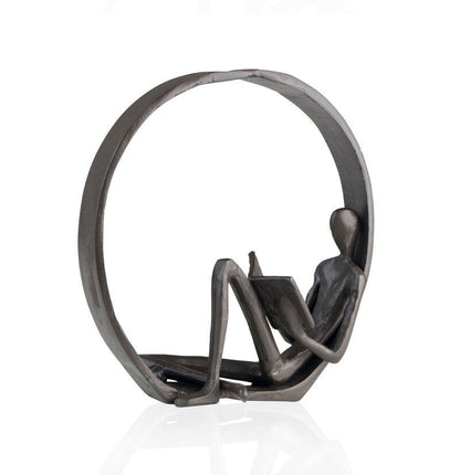 Iron Reader Sculpture