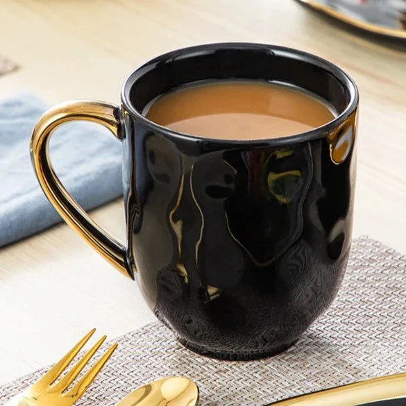 Black Dinnerware Set with Gold Trim