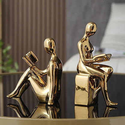 Modern Gold Couple Reading Statue Set