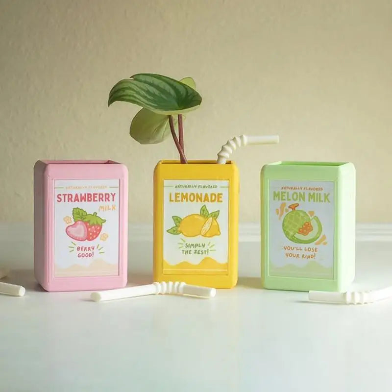 Pot de fleurs en forme de boîte à jus