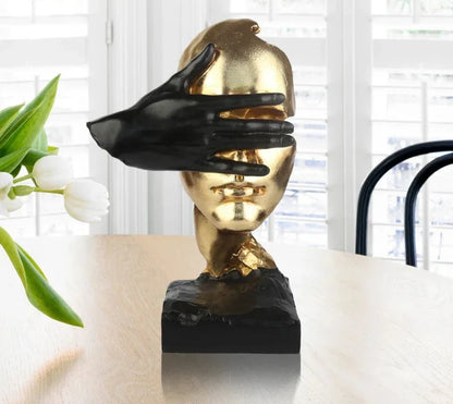 Abstract Gold and Black Face Sculpture