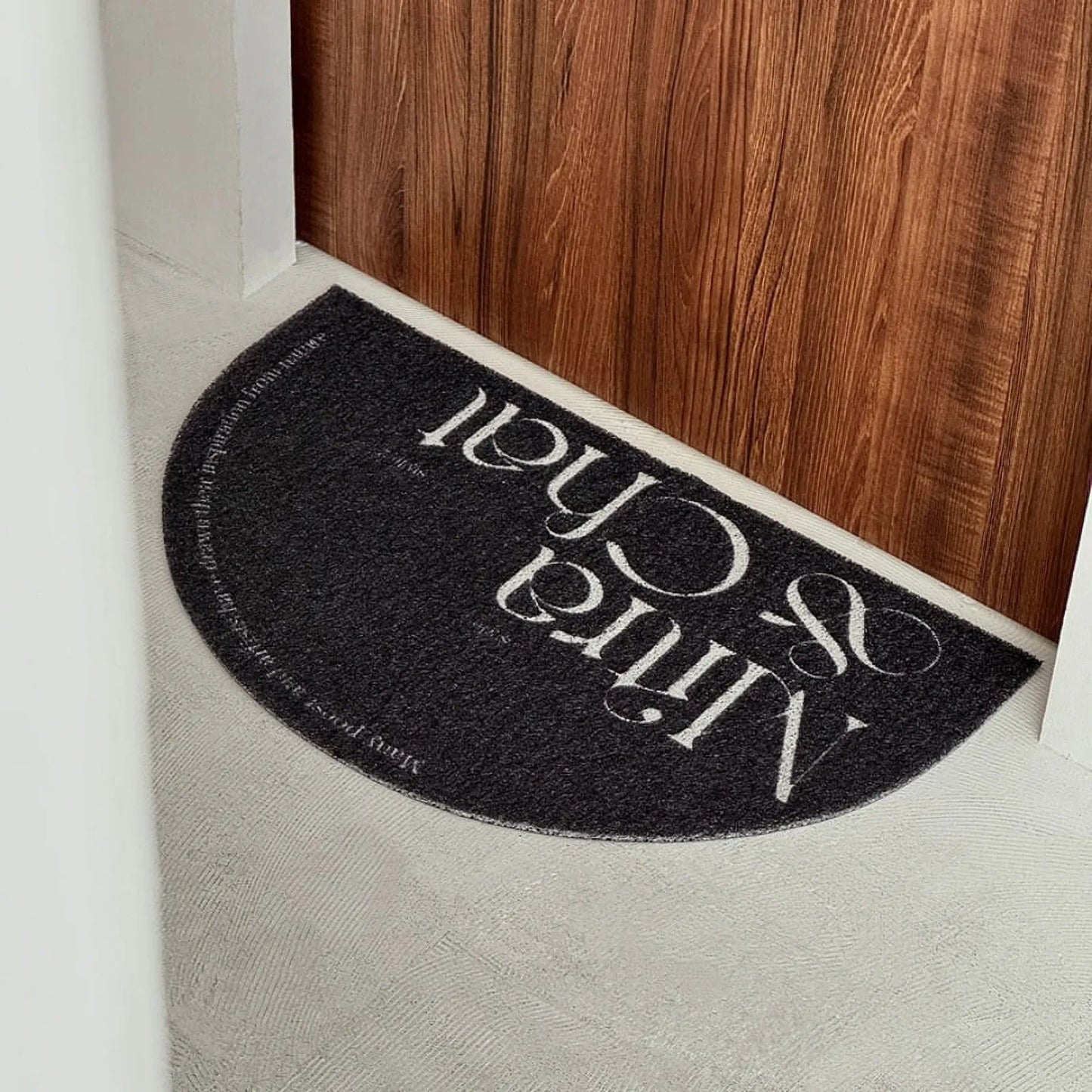 Textured Minimalist Typography PVC Coil Accent Rug