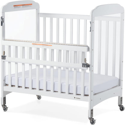 Foundations Serenity Safereach Crib with Adjustable Mattress Board, Compact Wooden Baby Crib with Commercial Grade Casters, Clear End Panels for Child Visibility, Includes 3” Foam Mattress (White) Baby Products Cribs Furniture Infant & Toddler Beds Nursery