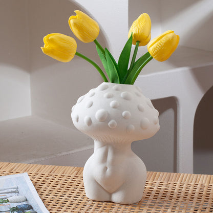 Vase en céramique blanche en forme de champignon