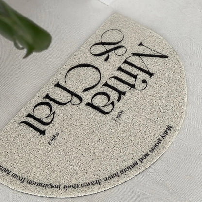 Textured Minimalist Typography PVC Coil Accent Rug