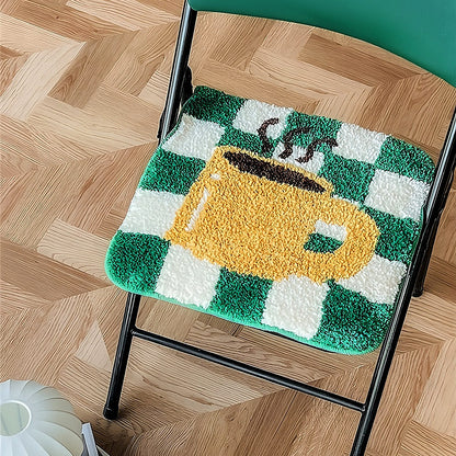 Sitzkissen mit getuftetem Kaffeetassen-Motiv