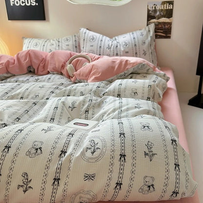 Conjunto de cama rosa empoeirado com estampa coquete