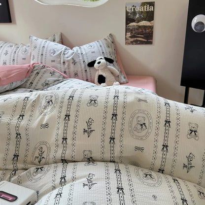 Conjunto de cama rosa empoeirado com estampa coquete