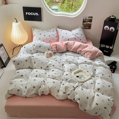 Conjunto de cama rosa claro com arcos femininos