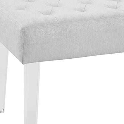 Benjara Tufted Fabric Upholstered Bench with Acrylic Legs, White and Clear Dining Room Furniture Furniture Home & Kitchen Table Benches