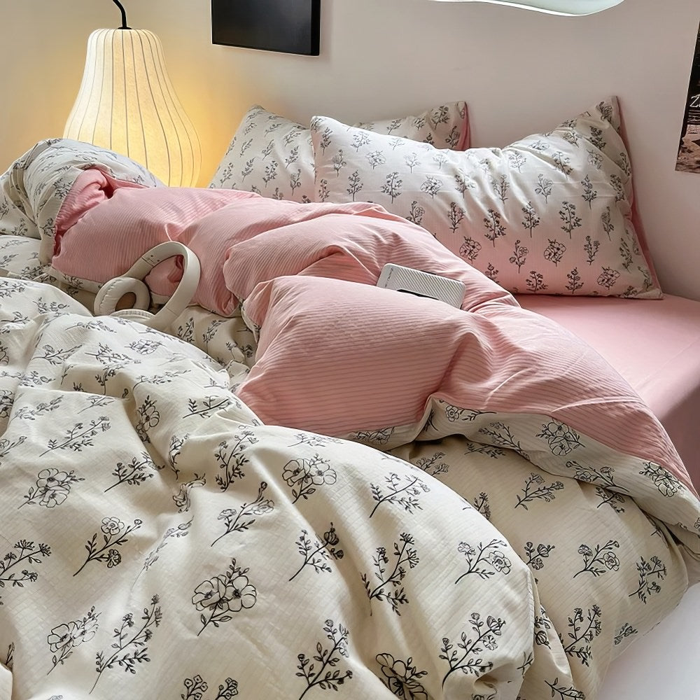 Conjunto de cama com estampa floral rosa claro