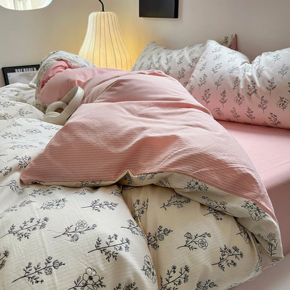 Juego de cama rosa pálido con estampado floral de contorno