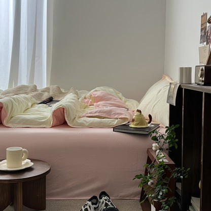 Parure de lit pastel rose pâle et jaune