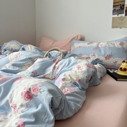 Romantisches Bettwäscheset mit floraler Spitze in Blau und Rosa