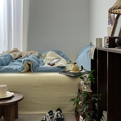 Parure de lit minimaliste bleu sauge à bords cousus