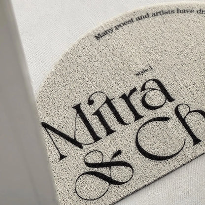 Textured Minimalist Typography PVC Coil Accent Rug